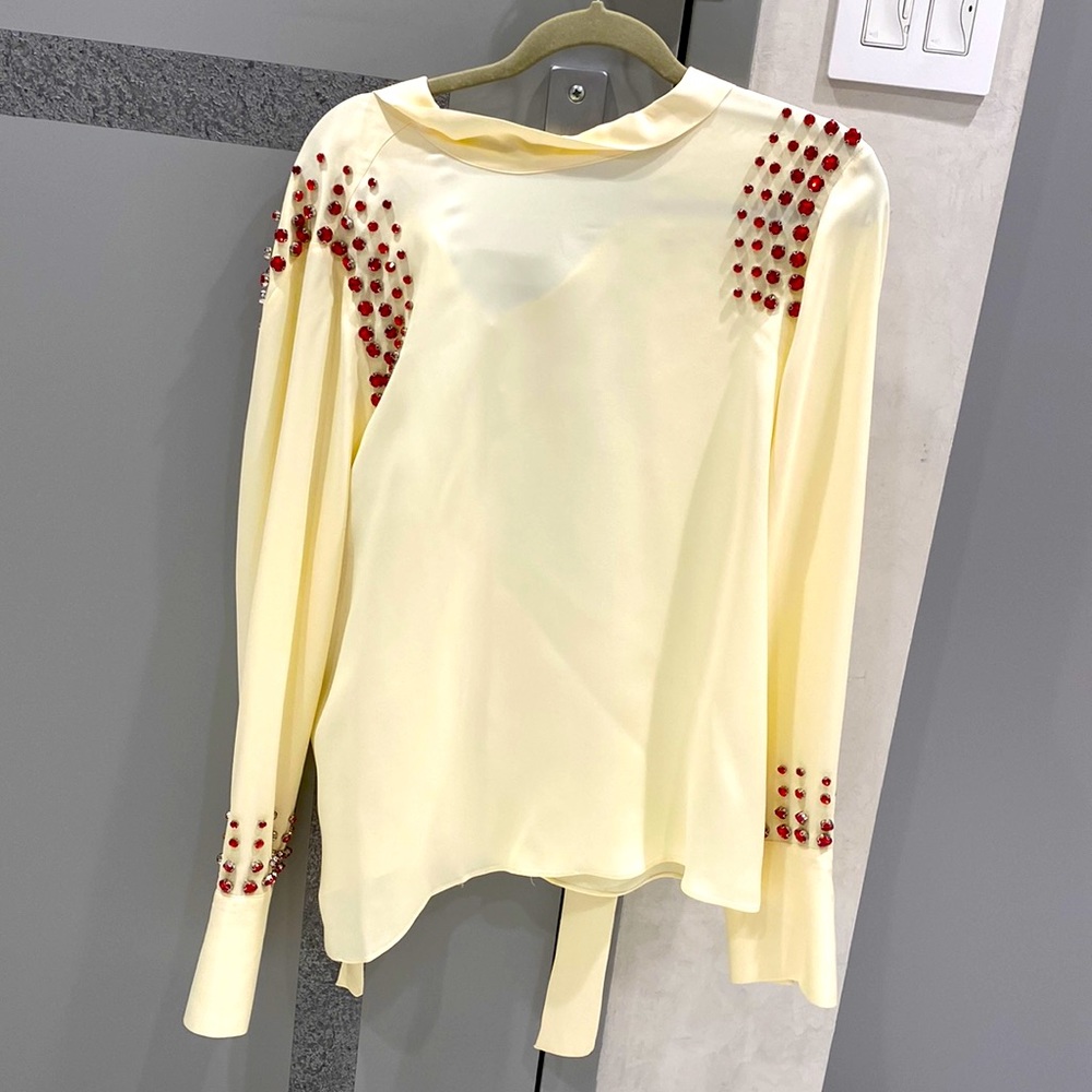 Evening light yellow evening blouse with red stones